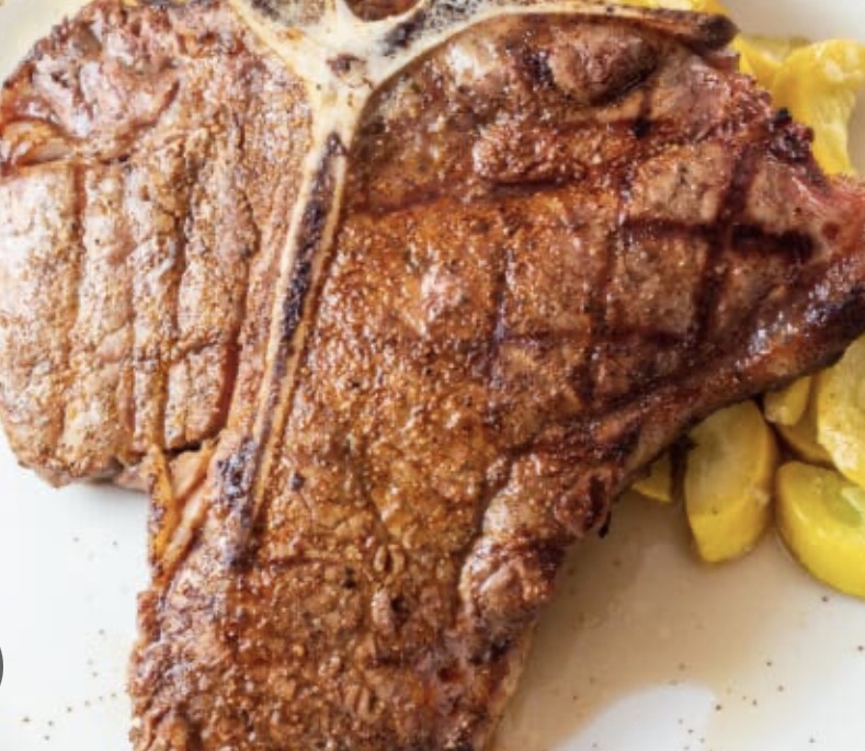 Smothered T-Bone steak w/ mushrooms and onions